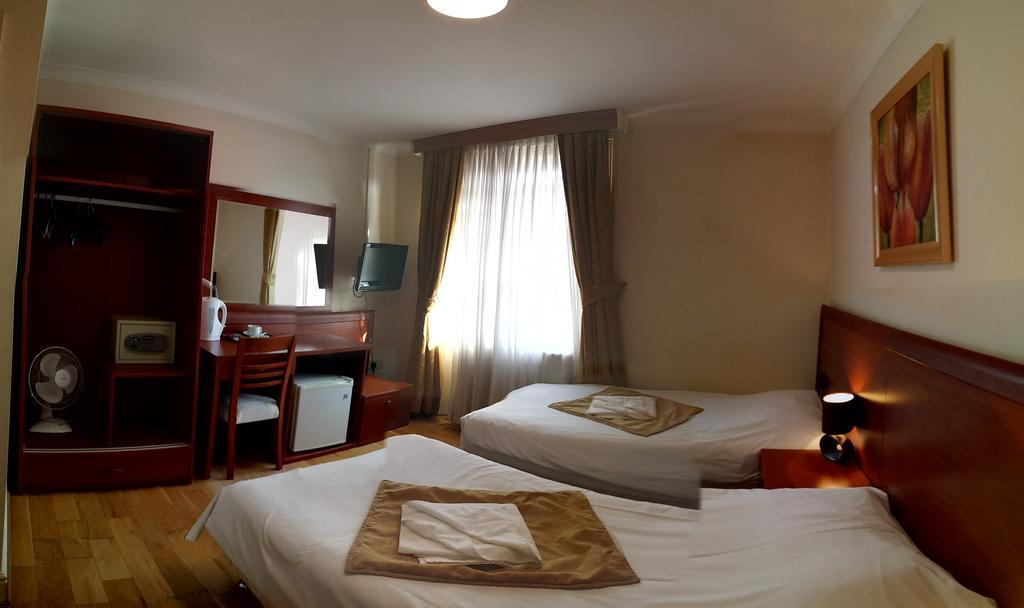 Corner House Hotel Λονδίνο Δωμάτιο φωτογραφία